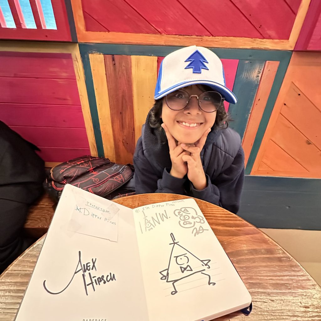 Shaiyar Dhillon showing off his Alex Hirsch autographs after Comic Con.