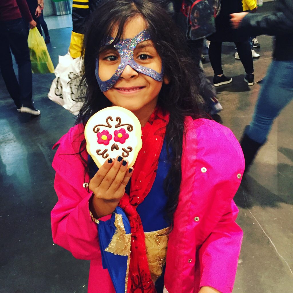A small Kavya dressed up as Ms. Marvel at NYCC.