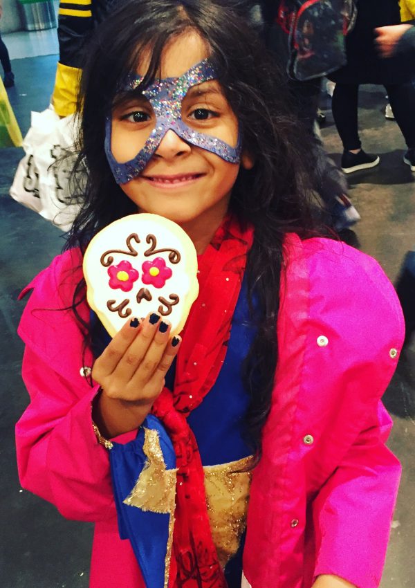 A small Kavya dressed up as Ms. Marvel at NYCC.
